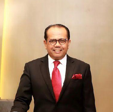 Dr. Juniver Girsang